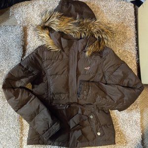 Hollister brown winter jacket with fur on hood and waist belt.